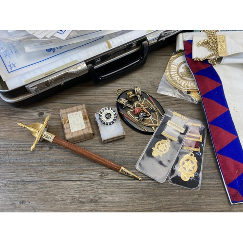 567 - A collection of masonic regalia to include jewels, sashes, Masonic Edition Holy Bible etc.