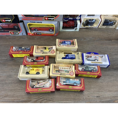 494 - A collection of boxed diecast model vehicles to include Bburago, Oxford Commercials, Lledo etc.