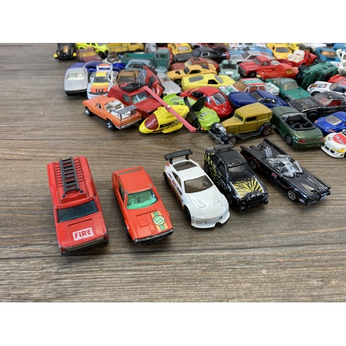 506 - A large collection of vintage diecast model vehicles to include Hot Wheels, Matchbox, Mattel etc.