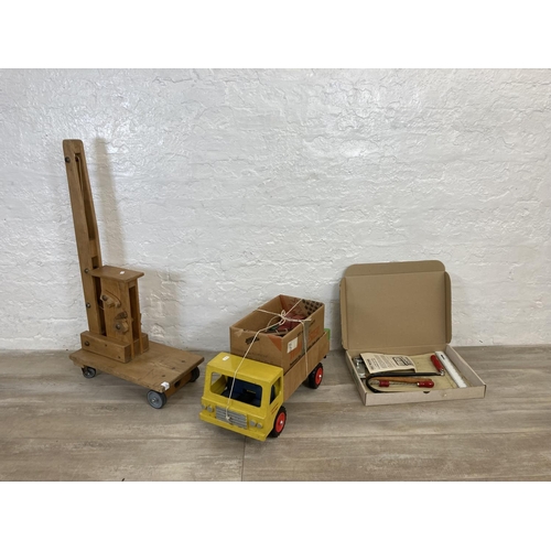 507 - Two vintage wooden toys, one Adventures Playthings Crane and one Camerons Haulage Truck together wit... 