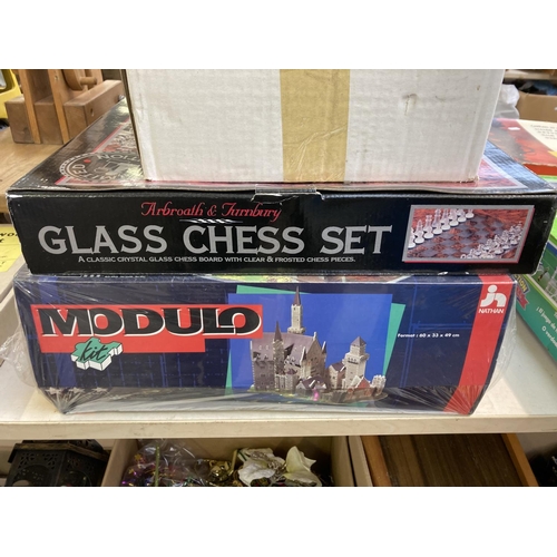 509 - A collection of items to include boxed Modulo Construction Kit, boxed glass chess set, diecast model... 