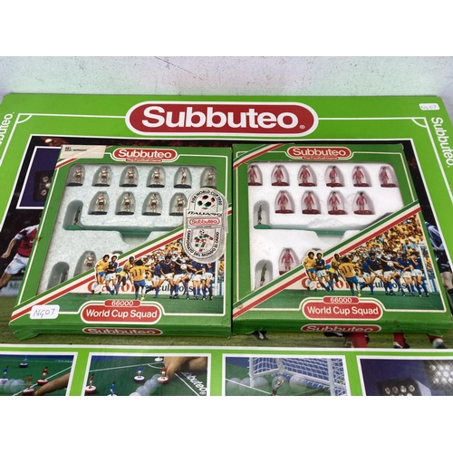 511 - Three vintage Subbuteo Sets, one Football Pitch with Floodlights, one West Germany 66000 World Cup S... 