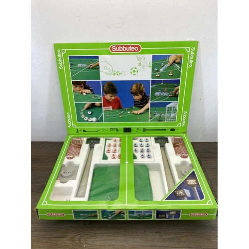 511 - Three vintage Subbuteo Sets, one Football Pitch with Floodlights, one West Germany 66000 World Cup S... 