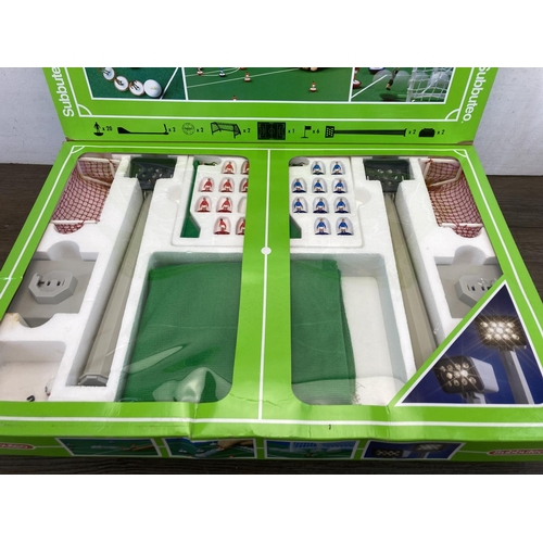 511 - Three vintage Subbuteo Sets, one Football Pitch with Floodlights, one West Germany 66000 World Cup S... 