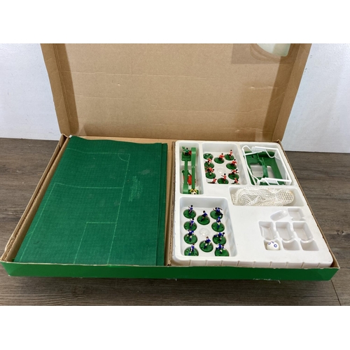 511 - Three vintage Subbuteo Sets, one Football Pitch with Floodlights, one West Germany 66000 World Cup S... 