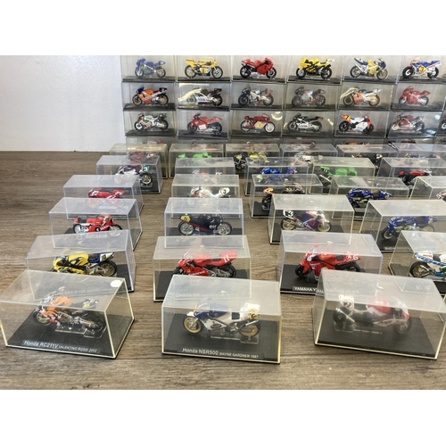 513 - A large collection of boxed motorcycle diecast model vehicles