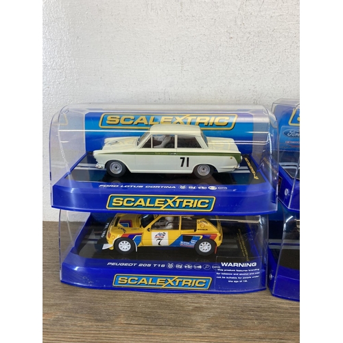 516A - Six boxed Scalextric slot cars, MGB 1964 Sebring, Jaguar D-Type, Peugeot 205 T16, Ford Lotus Cortina... 