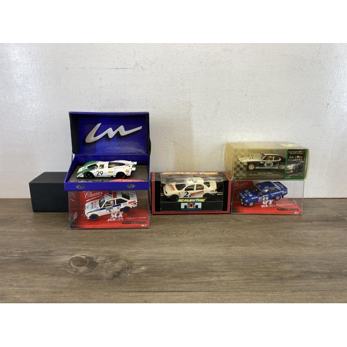 516B - Five boxed slot cars, two SCX Classics Series Ford Escort MKII's, Scalextric Ford Mondeo C.579, SRC ... 