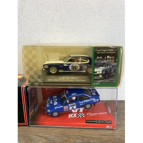 516B - Five boxed slot cars, two SCX Classics Series Ford Escort MKII's, Scalextric Ford Mondeo C.579, SRC ... 