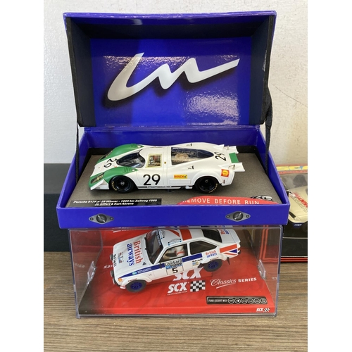 516B - Five boxed slot cars, two SCX Classics Series Ford Escort MKII's, Scalextric Ford Mondeo C.579, SRC ... 