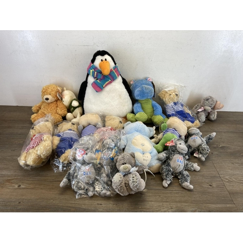 518 - A collection of soft toys to include Ty Beanie Babies etc.