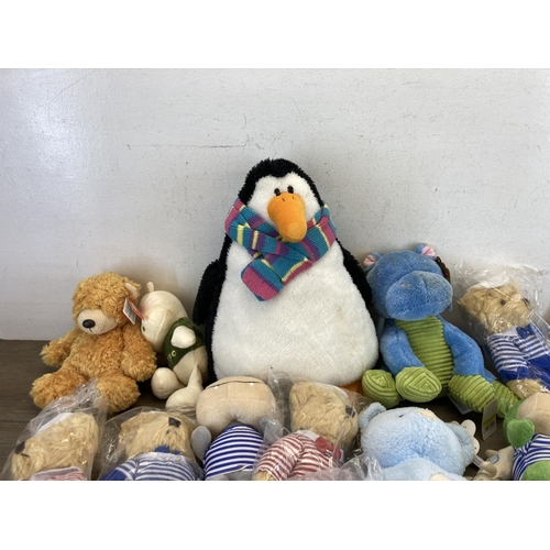 518 - A collection of soft toys to include Ty Beanie Babies etc.