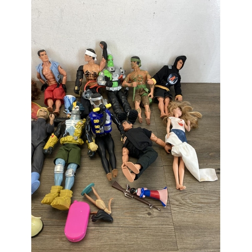 520A - A collection of Action Man, dolls and accessories to include Tempest Villain, Doctor Robot etc.