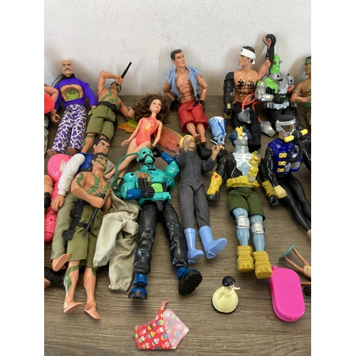 520A - A collection of Action Man, dolls and accessories to include Tempest Villain, Doctor Robot etc.