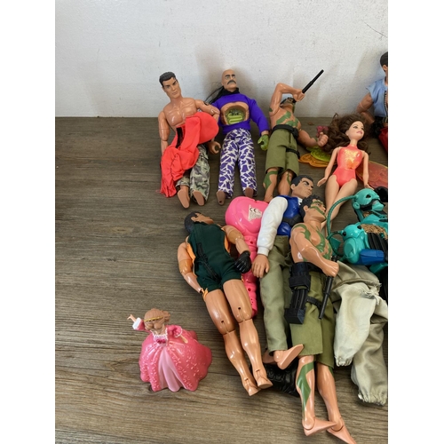 520A - A collection of Action Man, dolls and accessories to include Tempest Villain, Doctor Robot etc.