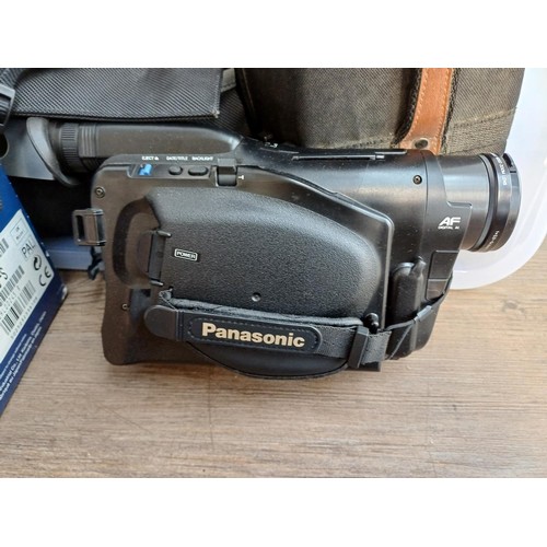 790 - A large box containing a collection of camcorders to include boxed Panasonic NV-GS75 Mini DV 3CCD 1.... 