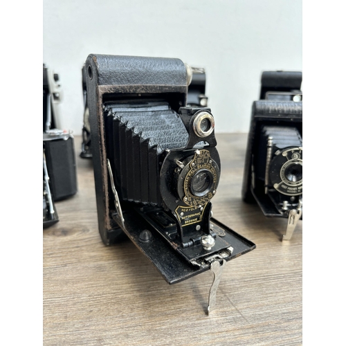 794 - Eleven folding cameras to include Zeiss Ikon Nettar 515/16, Voigtländer Bessa, Kodak Six-20 Junior m... 