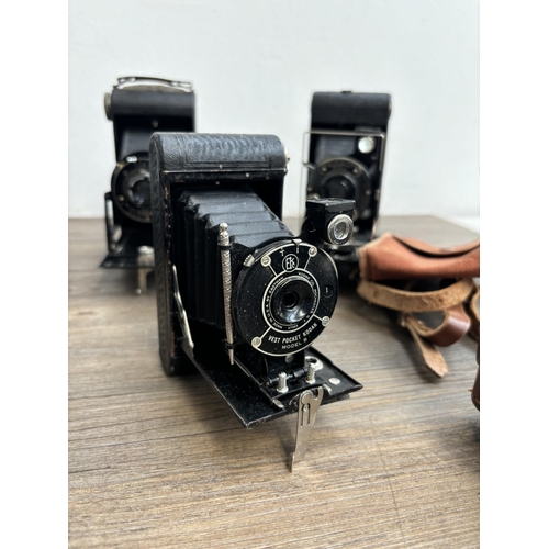 794 - Eleven folding cameras to include Zeiss Ikon Nettar 515/16, Voigtländer Bessa, Kodak Six-20 Junior m... 