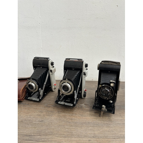 794 - Eleven folding cameras to include Zeiss Ikon Nettar 515/16, Voigtländer Bessa, Kodak Six-20 Junior m... 