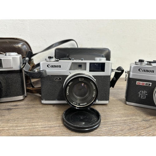 804 - Four 35mm rangefinder cameras, one Canon Canonet QL17 G-III, one cased Minolta A5, one cased Yashica... 