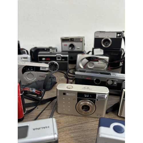 808 - A collection of cameras to include Fujifilm, Kodak, Hanimex etc.