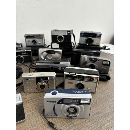 808 - A collection of cameras to include Fujifilm, Kodak, Hanimex etc.