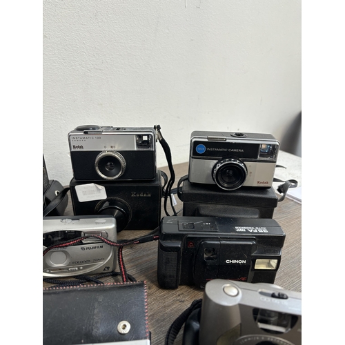 808 - A collection of cameras to include Fujifilm, Kodak, Hanimex etc.