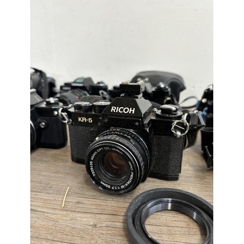 812 - Ten 35mm SLR cameras to include Ricoh KR-5, Chinon CE-5, Centon DF-300 etc.