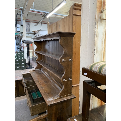 1 - A Nigel Griffiths carved oak dresser - approx. 165cm high x 167cm wide x 42cm deep