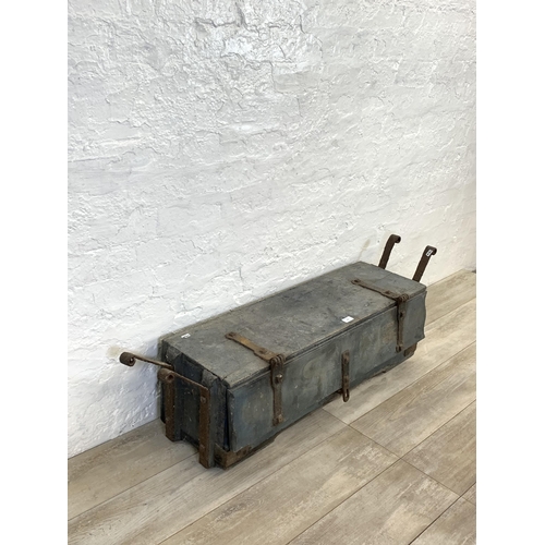 103 - A 19th century painted pine and wrought iron storage trunk - approx. 31cm high x 121cm long x 29cm w... 