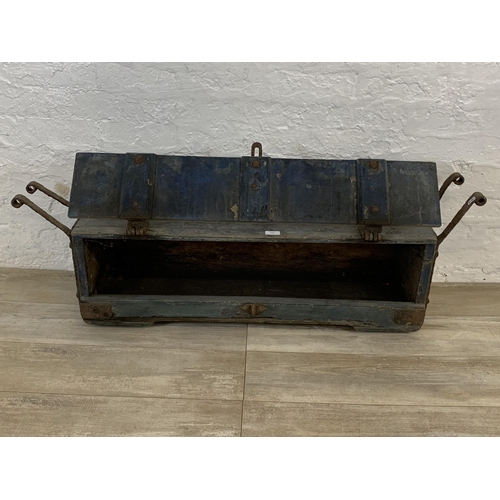 103 - A 19th century painted pine and wrought iron storage trunk - approx. 31cm high x 121cm long x 29cm w... 