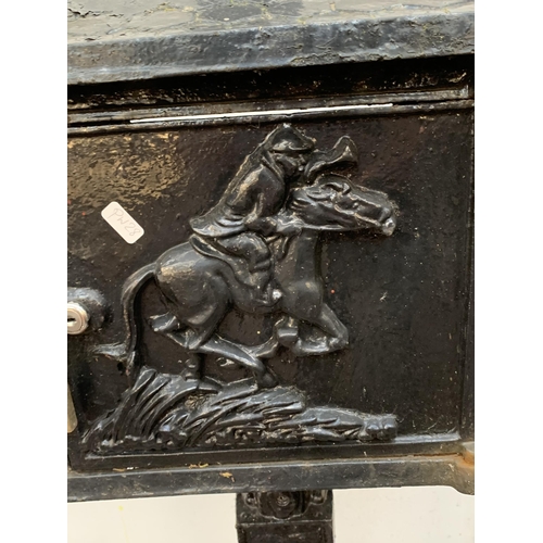 107 - A Victorian style cast iron and black painted post box on stand - approx. 117cm high