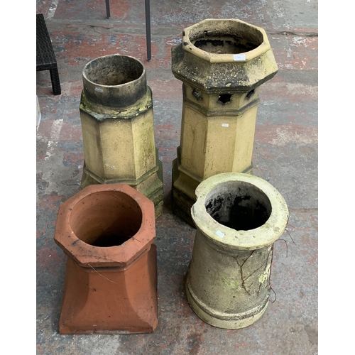 109 - Four antique chimney pots, three cast stone and one terracotta