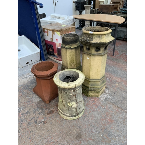 109 - Four antique chimney pots, three cast stone and one terracotta