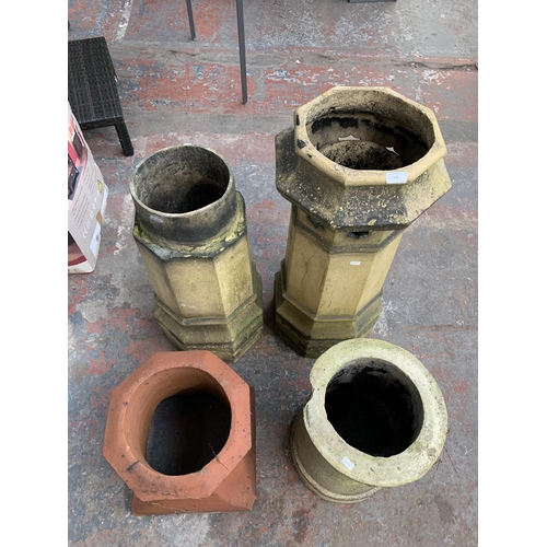 109 - Four antique chimney pots, three cast stone and one terracotta