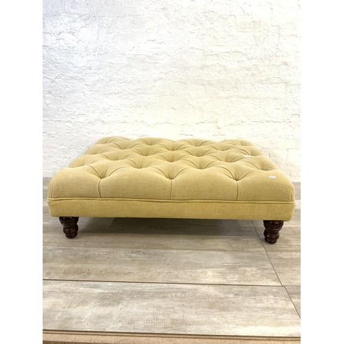 11 - A Victorian style Chesterfield yellow fabric upholstered footstool - approx. 31cm high x 99cm wide x... 