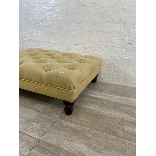 11 - A Victorian style Chesterfield yellow fabric upholstered footstool - approx. 31cm high x 99cm wide x... 