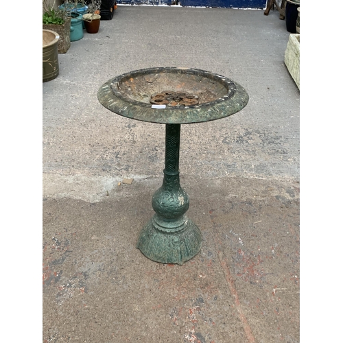 110 - A Victorian style cast iron green painted bird bath - approx. 65cm high