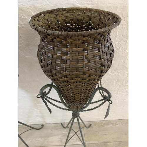 13 - A pair of French style patinated cast metal and wicker floor vases - each approx. 103cm high