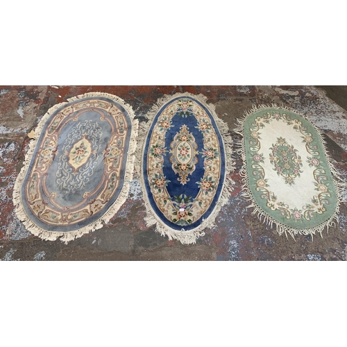 14 - Three vintage Chinese woollen rugs