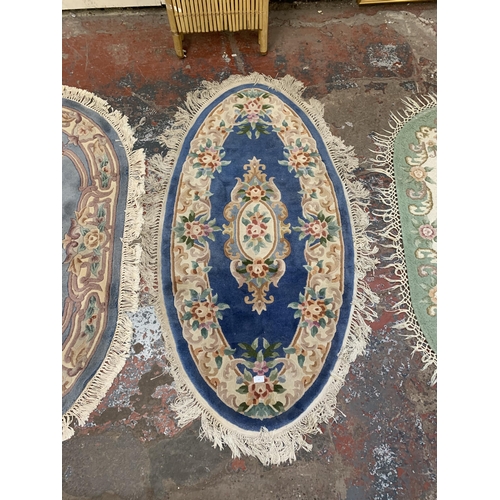 14 - Three vintage Chinese woollen rugs