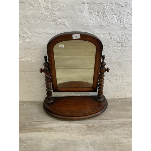 15 - A Victorian mahogany swing mirror on bobbin supports - approx. 50cm high x 43cm wide x 18.5cm deep