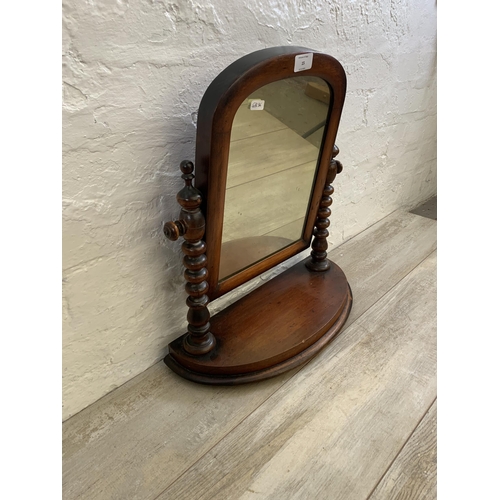 15 - A Victorian mahogany swing mirror on bobbin supports - approx. 50cm high x 43cm wide x 18.5cm deep