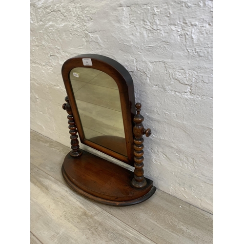 15 - A Victorian mahogany swing mirror on bobbin supports - approx. 50cm high x 43cm wide x 18.5cm deep