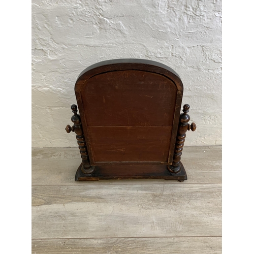 15 - A Victorian mahogany swing mirror on bobbin supports - approx. 50cm high x 43cm wide x 18.5cm deep