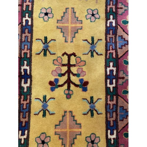 20 - Three mid/late 20th century woollen rugs