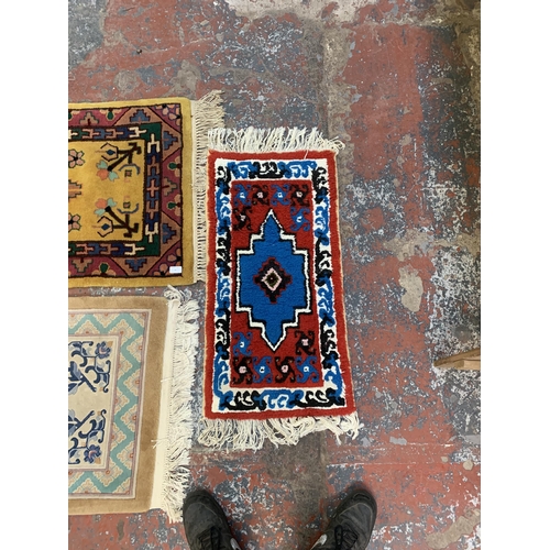 20 - Three mid/late 20th century woollen rugs