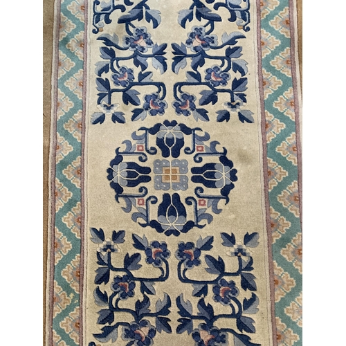 20 - Three mid/late 20th century woollen rugs