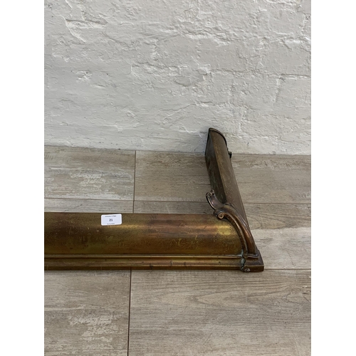 21 - A Victorian brass fire fender - approx. 129cm wide