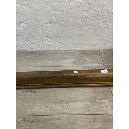 21 - A Victorian brass fire fender - approx. 129cm wide